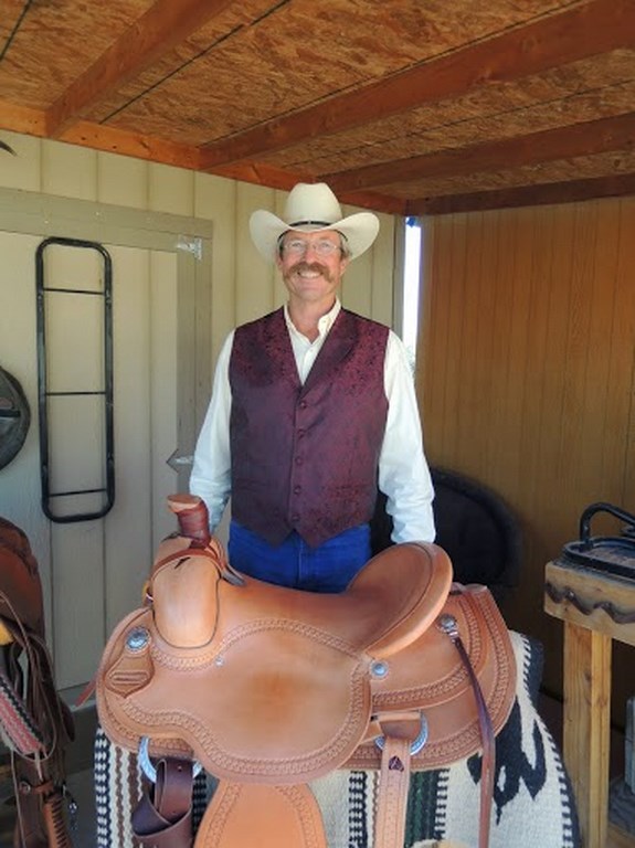 Saddler Ed huie with one of his custom saddles!